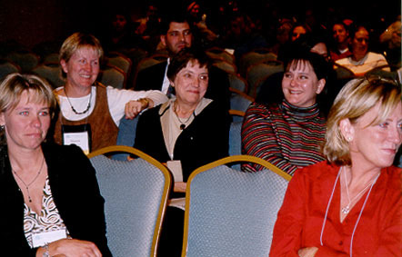 Dr. Char Ward is surprised by her colleagues after hearing from Micki that she is the 2003 awardee.